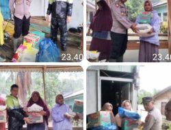 Kapolsek Darul Aman Bersama Camat Serahkan Bantuan Kepada Warga Terdampak Banjir